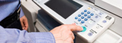 Man working with copier